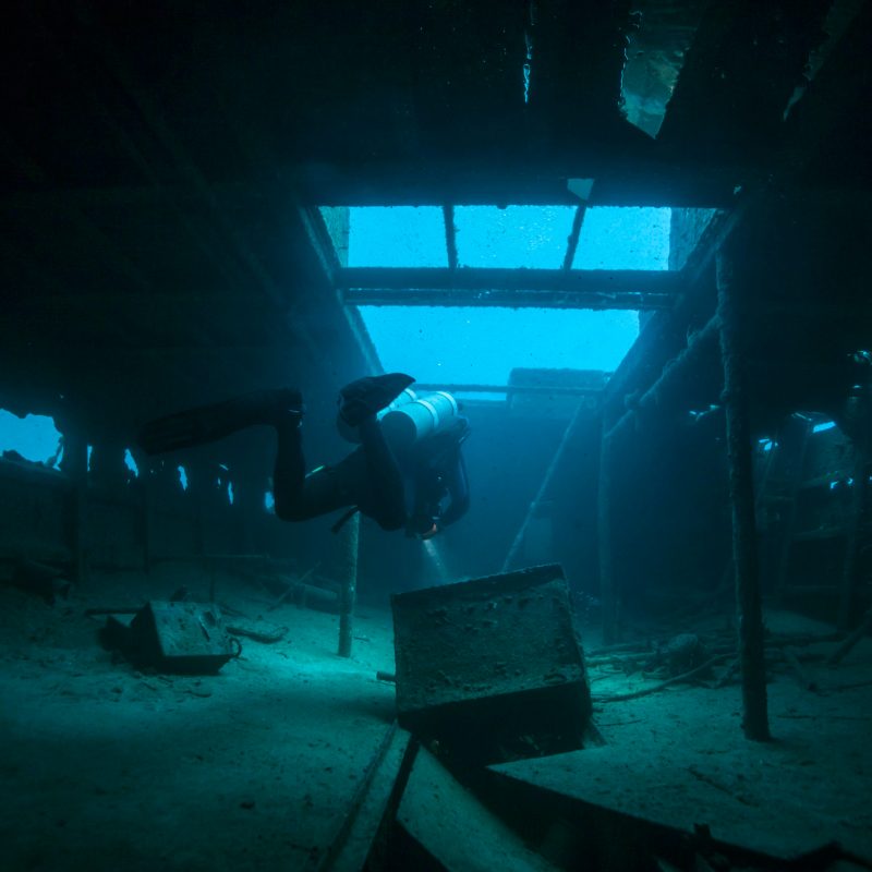 a person in a dark room